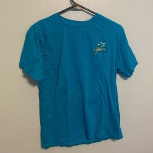 Teal shirt that hasn’t been worn